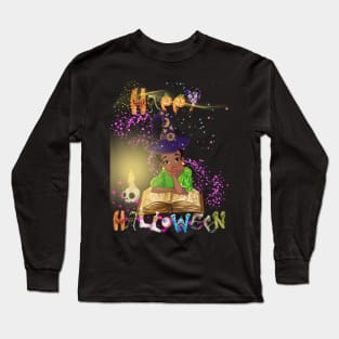 Young witch reading spellbook before halloween start Long Sleeve T-Shirt